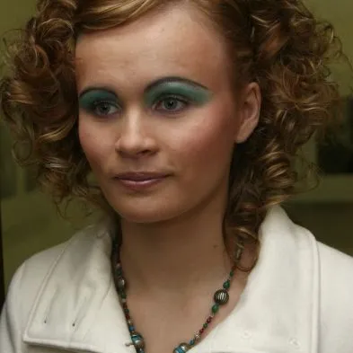 Woman with styled hair and makeup